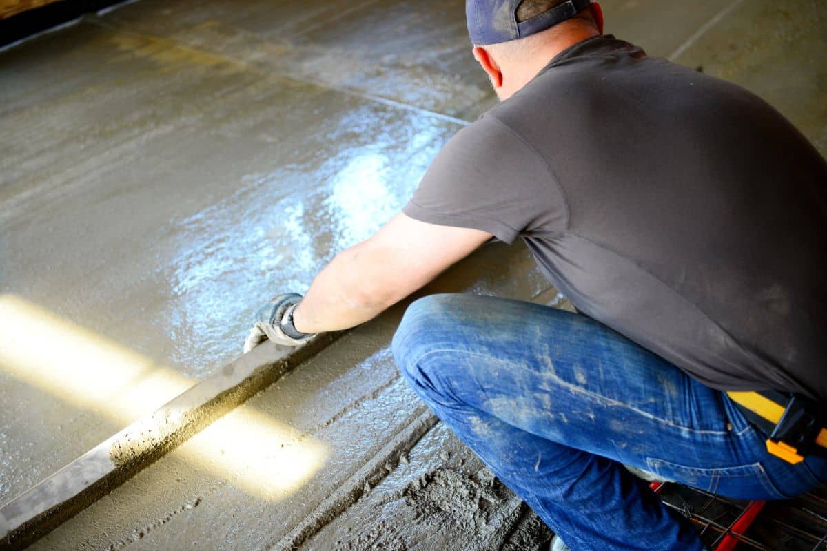 Arnold Ready Mix worker smoothing out concrete