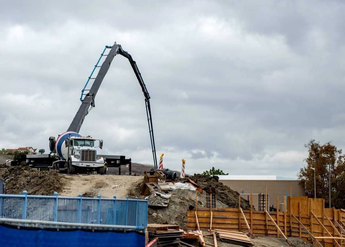 shutterstock_1260521974-1200 Arnold Ready Mix using boom truck on construction site for client